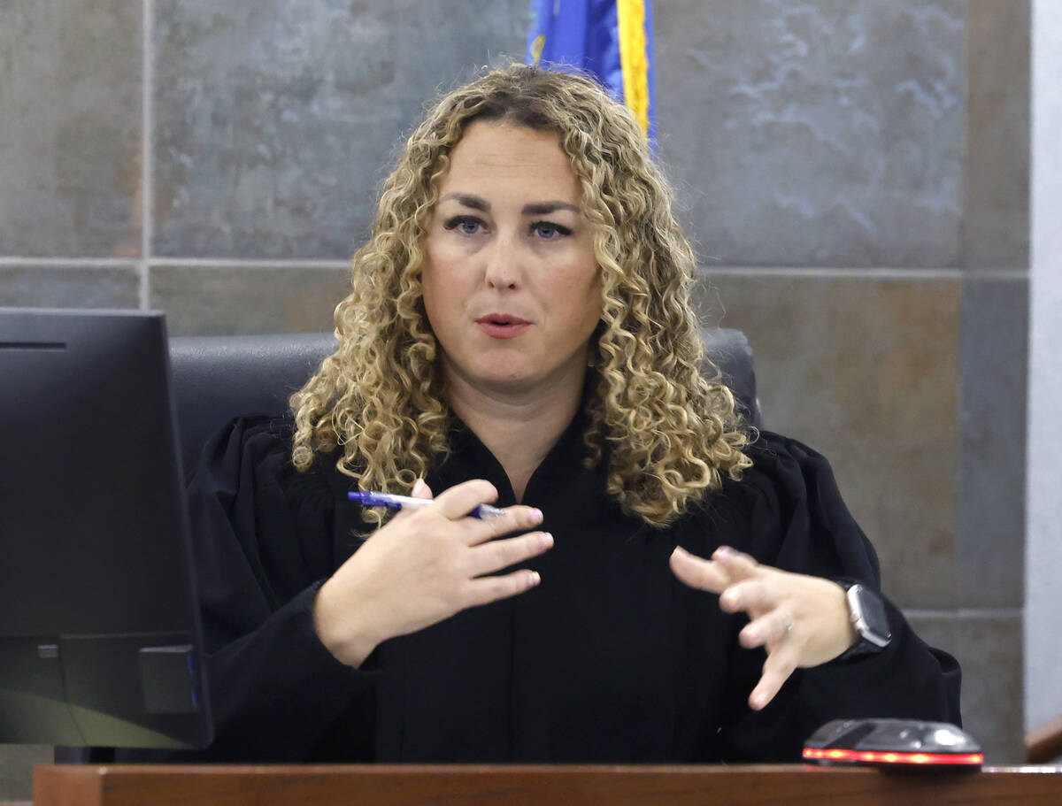 District Court Judge Carli Kierny presides over Duane Davis', who is accused of orchestrating t ...