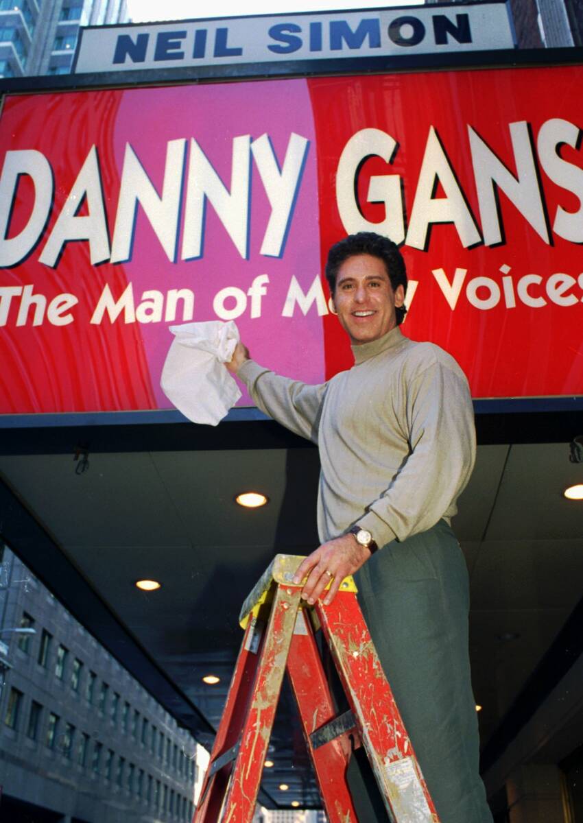 FILE*** In this Sept. 27, 1995 file photo, Danny Gans dusts off the marquee of New York's Nei ...