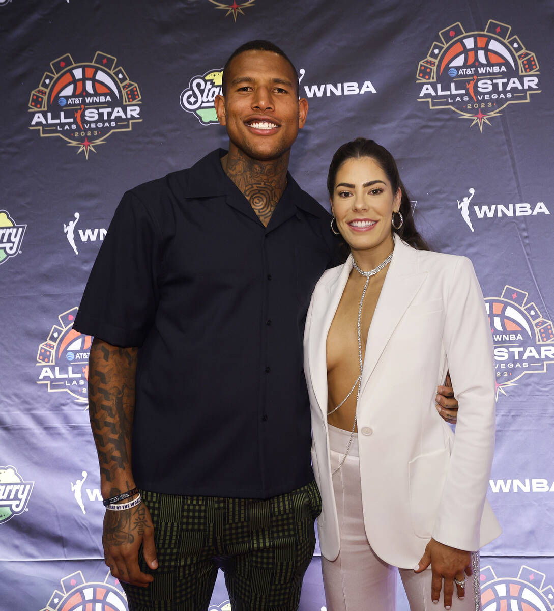 Kelsey Plum of Las Vegas Aces poses for a photo with New York Giants’ Darren Waller on the WN ...