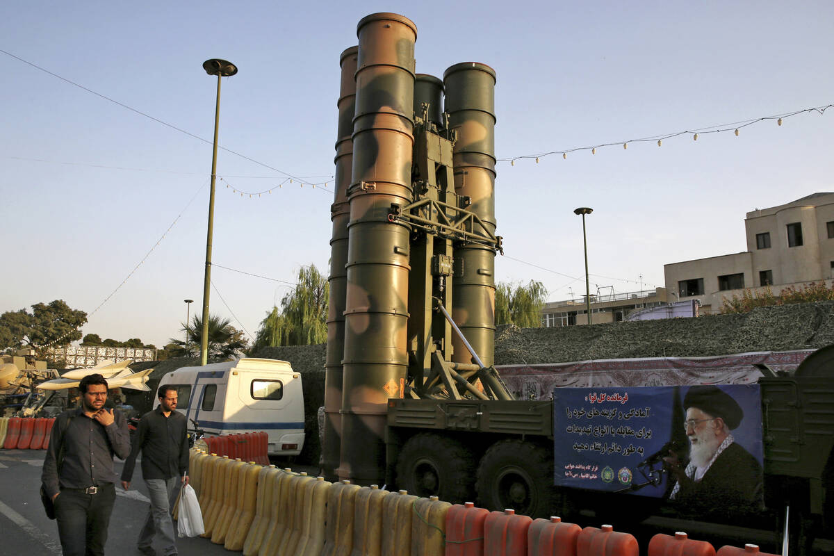 FILE - A Russian-made S-300 air defense system sits on display for the annual Defense Week, mar ...
