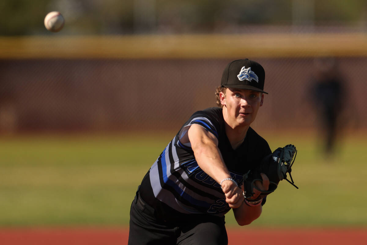 Basic Lincoln Evans (21) throws to Faith Lutheran during a high school baseball game on Tuesday ...