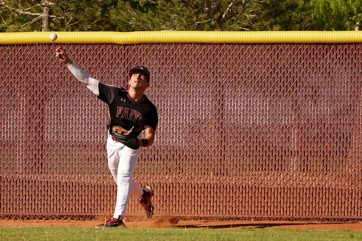 Faith Lutheran outfielder Christian Gross (4) throws in field during a high school baseball gam ...