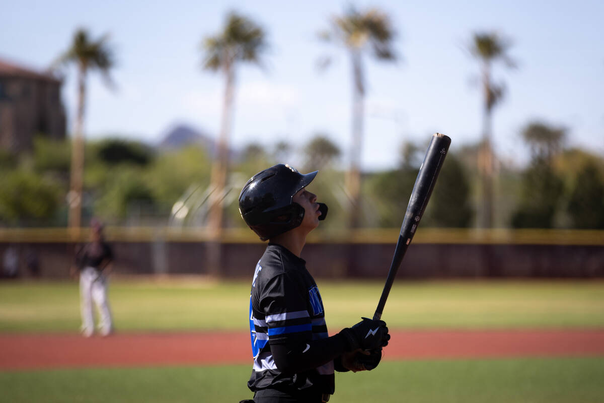 Basic second baseman Tate Southisene (8) prepares to bat against Faith Lutheran during a high s ...