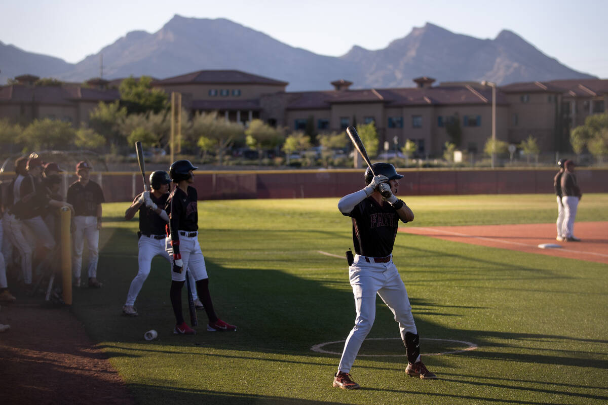 Faith Lutheran warms up to bat during a high school baseball game against Basic on Tuesday, Apr ...