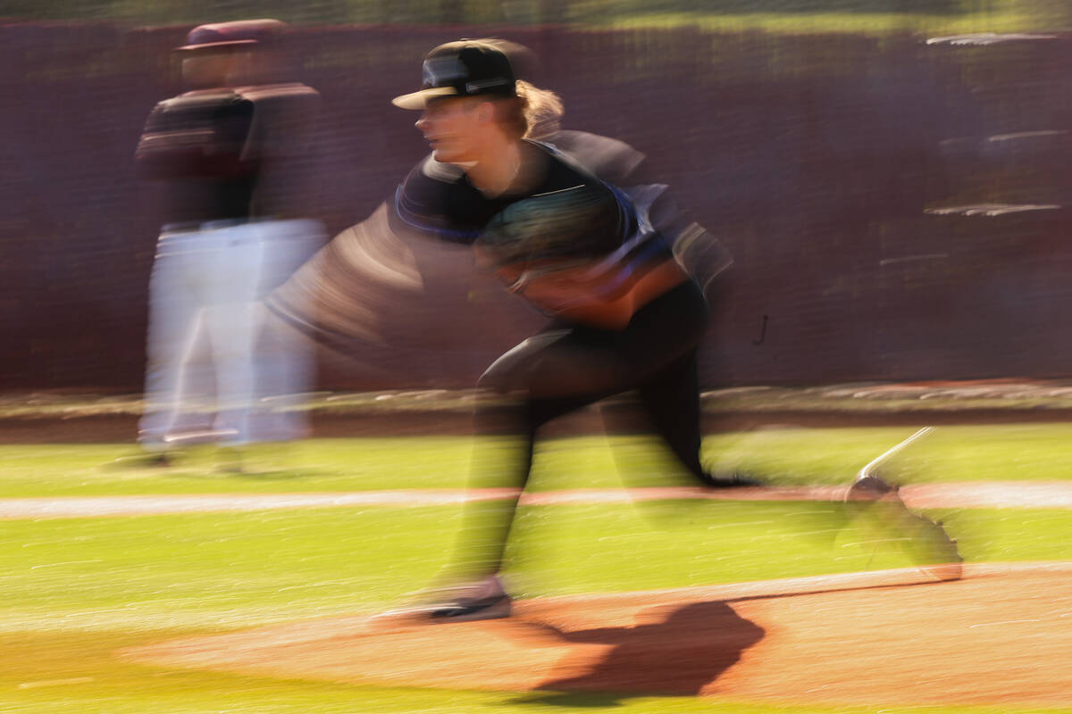 Basic pitcher Lincoln Evans (21) throws to Faith Lutheran during a high school baseball game on ...