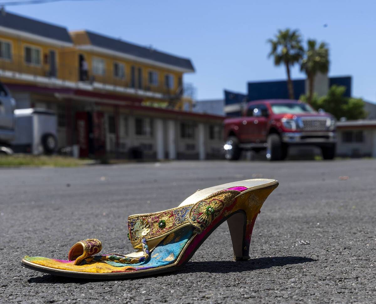 A high heeled shoe rests in the parking lot of the Gateway Motel which the Siegel Group recentl ...