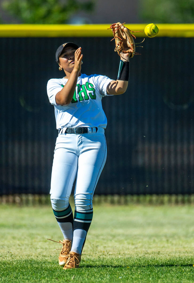 The Palo Verde bench cheers a hit against Centennial during the second inning of their girl's ...
