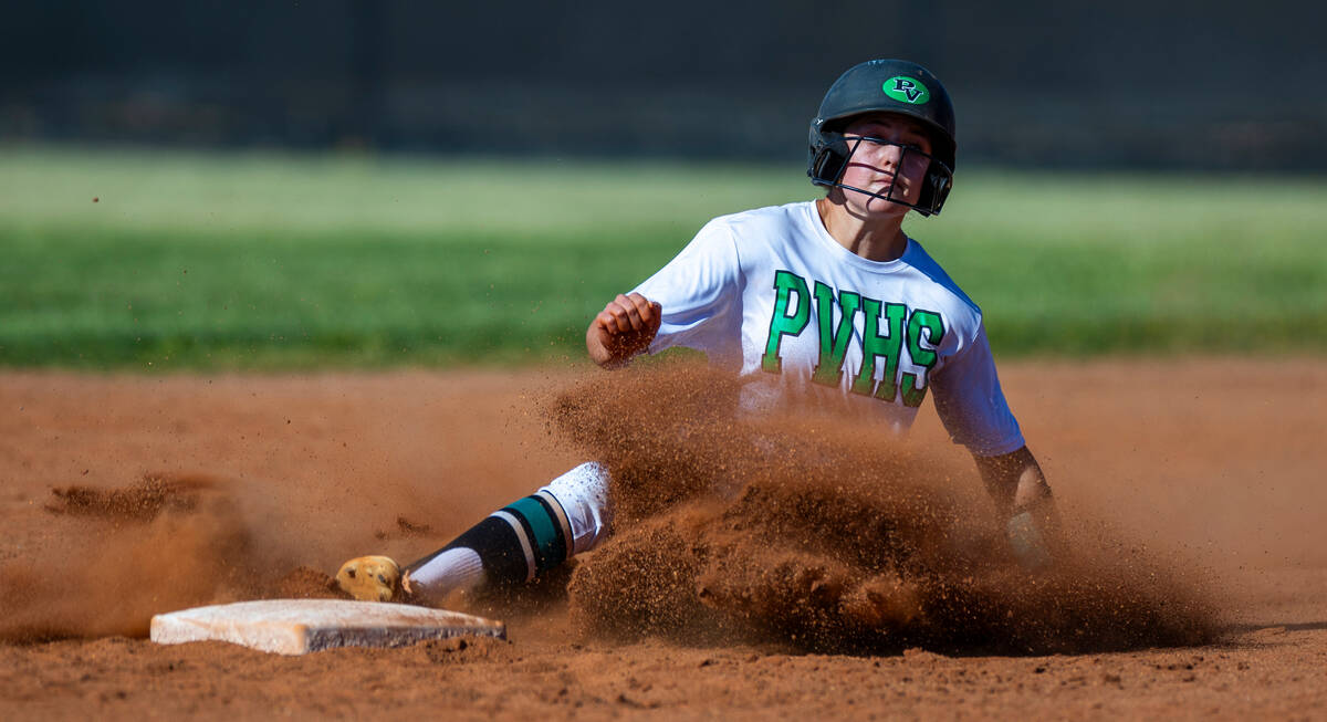 Palo Verde runner Taylor Johns (11) slides into second base way before a throw by a Centennial ...