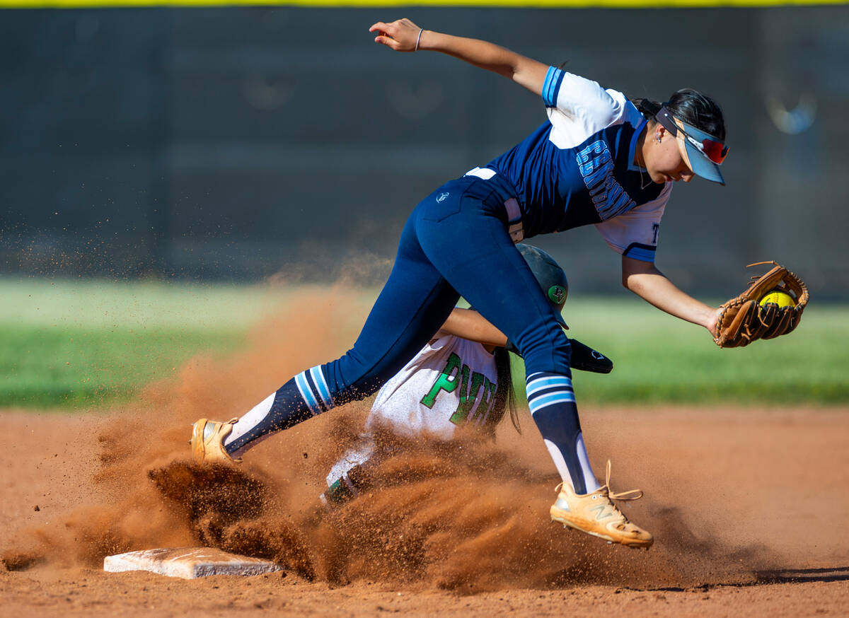 Palo Verde runner Kayleen Enriquez (6) is tagged out by Centennial infielder Rebeca Venzor-Nuno ...