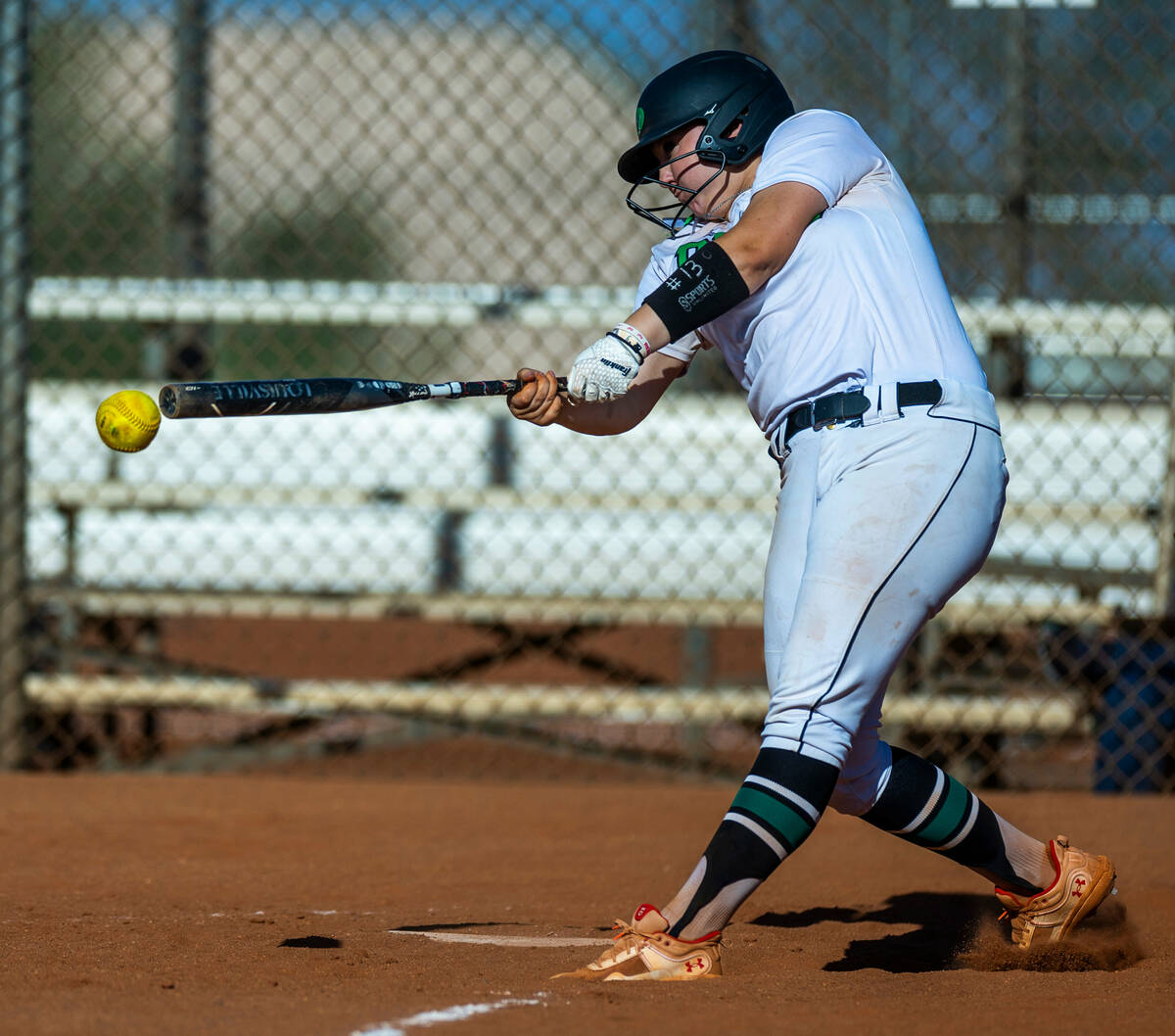 Palo Verde batter Bradi Odom (13) connects on a Centennial pitch during the fifth inning of the ...