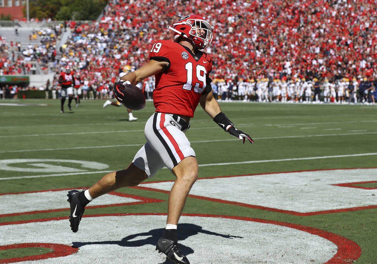 Georgia tight end Brock Bowers glides into the endzone on a 70-plus yard touchdown during an NC ...