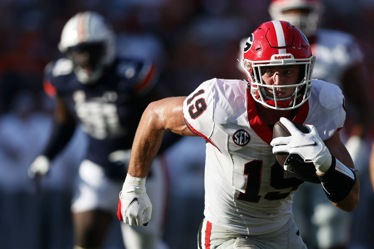 FILE - Georgia tight end Brock Bowers (19) carries the ball after a reception during the second ...