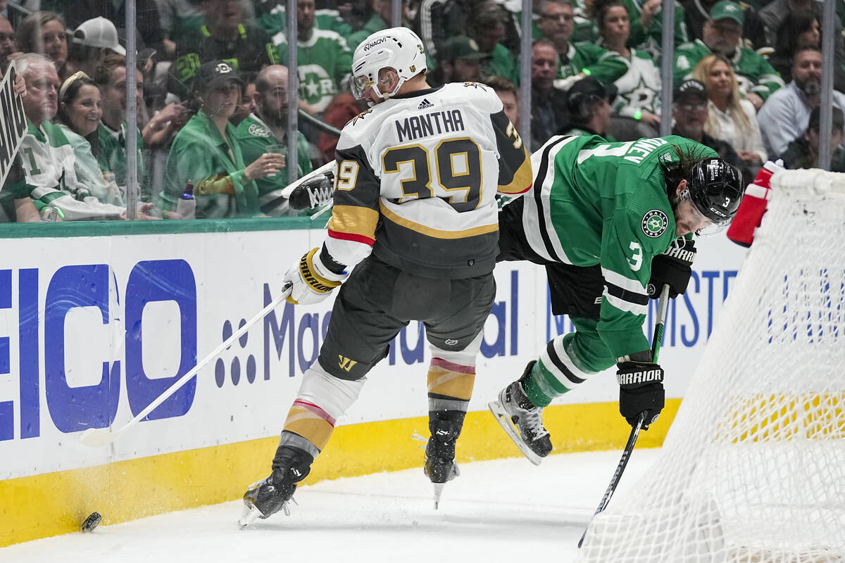 Vegas Golden Knights right wing Anthony Mantha (39) and Dallas Stars defenseman Chris Tanev (3) ...