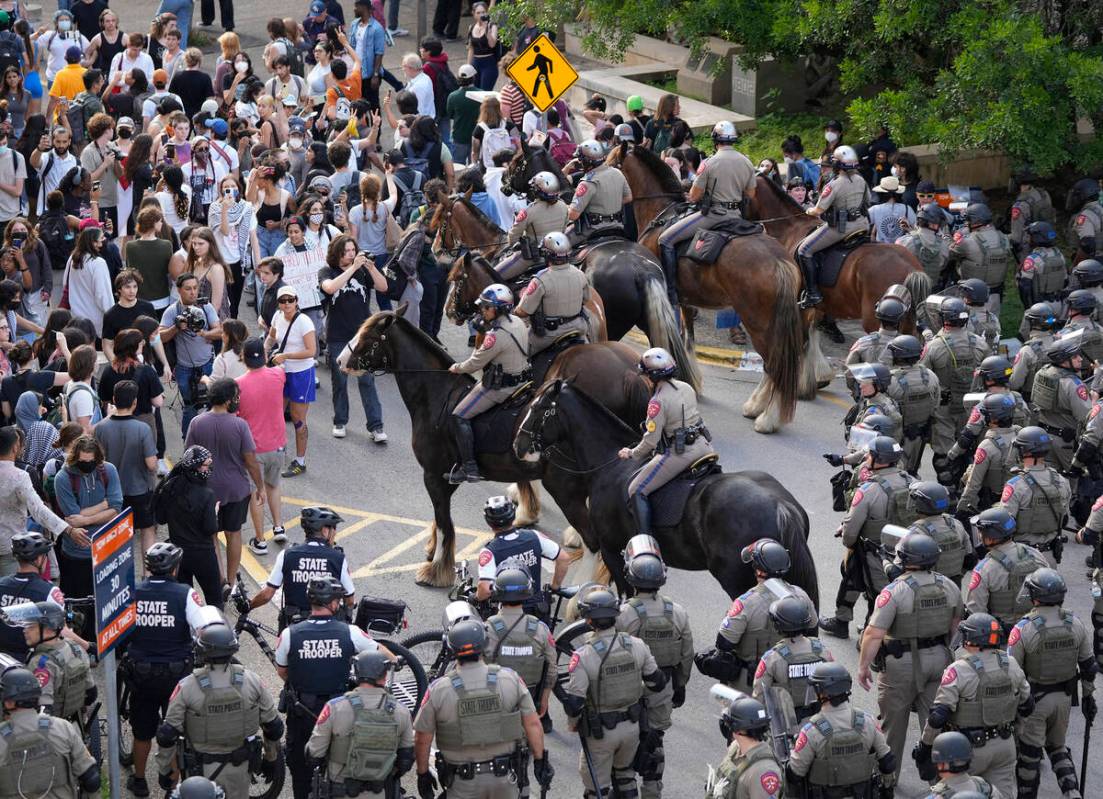 State troopers try to break up a pro-Palestinian protest at the University of Texas Wednesday A ...