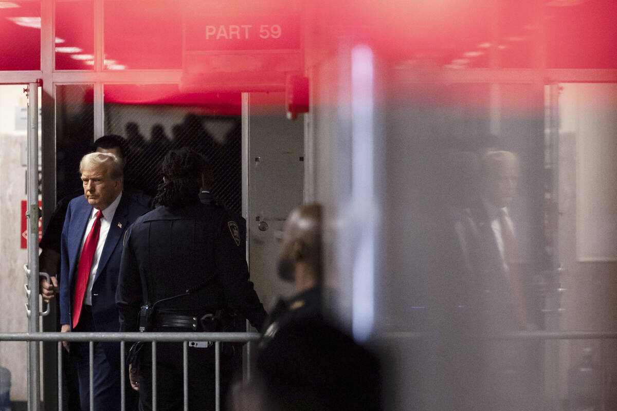 Former President Donald Trump leaves courtroom at Manhattan criminal court, Tuesday, April 23, ...