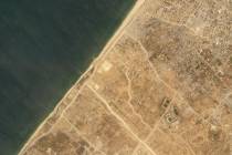 This satellite picture taken by Planet Labs PBC show the construction of a new aid port near Ga ...