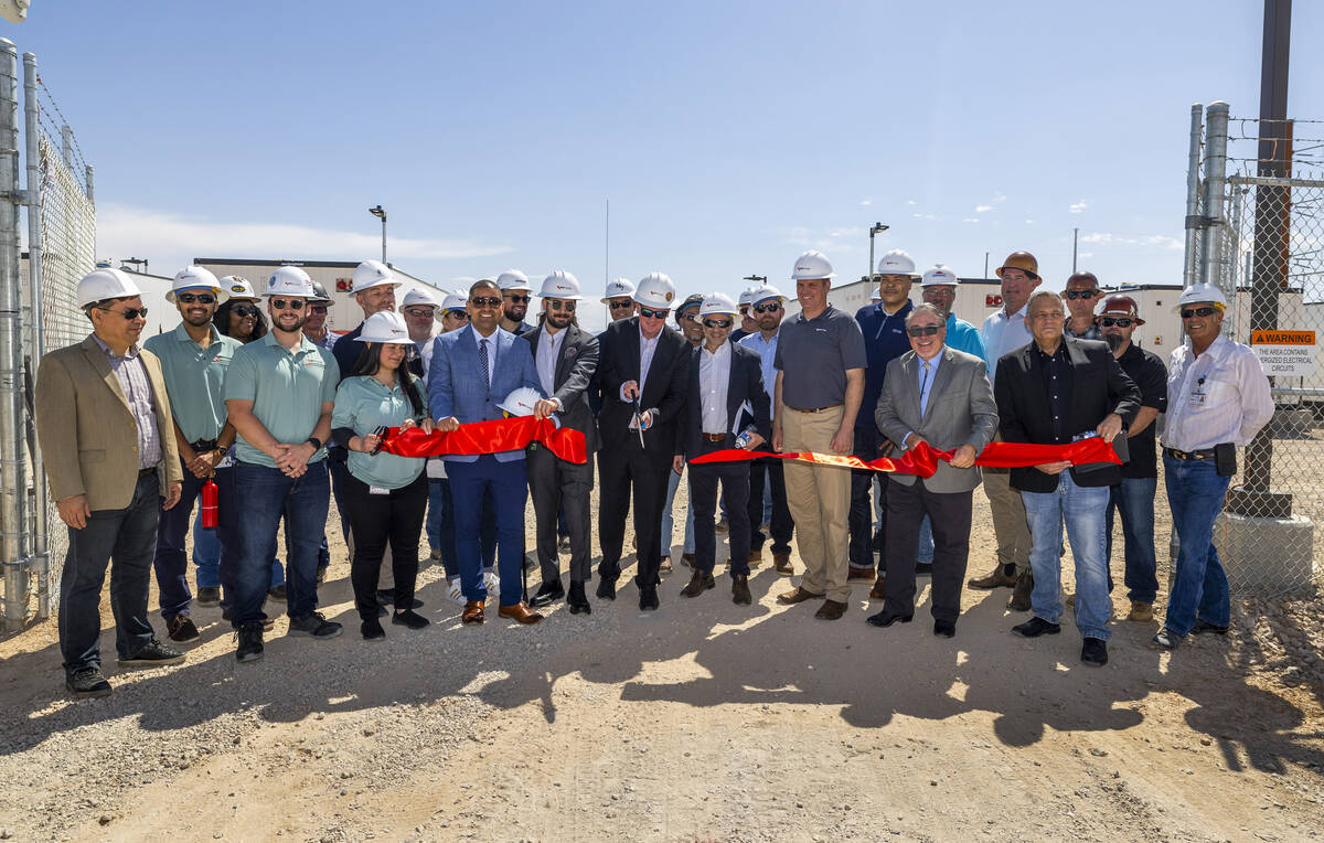 NV Energy personnel and other invited individuals conduct a ribbon cutting followed by a tour f ...