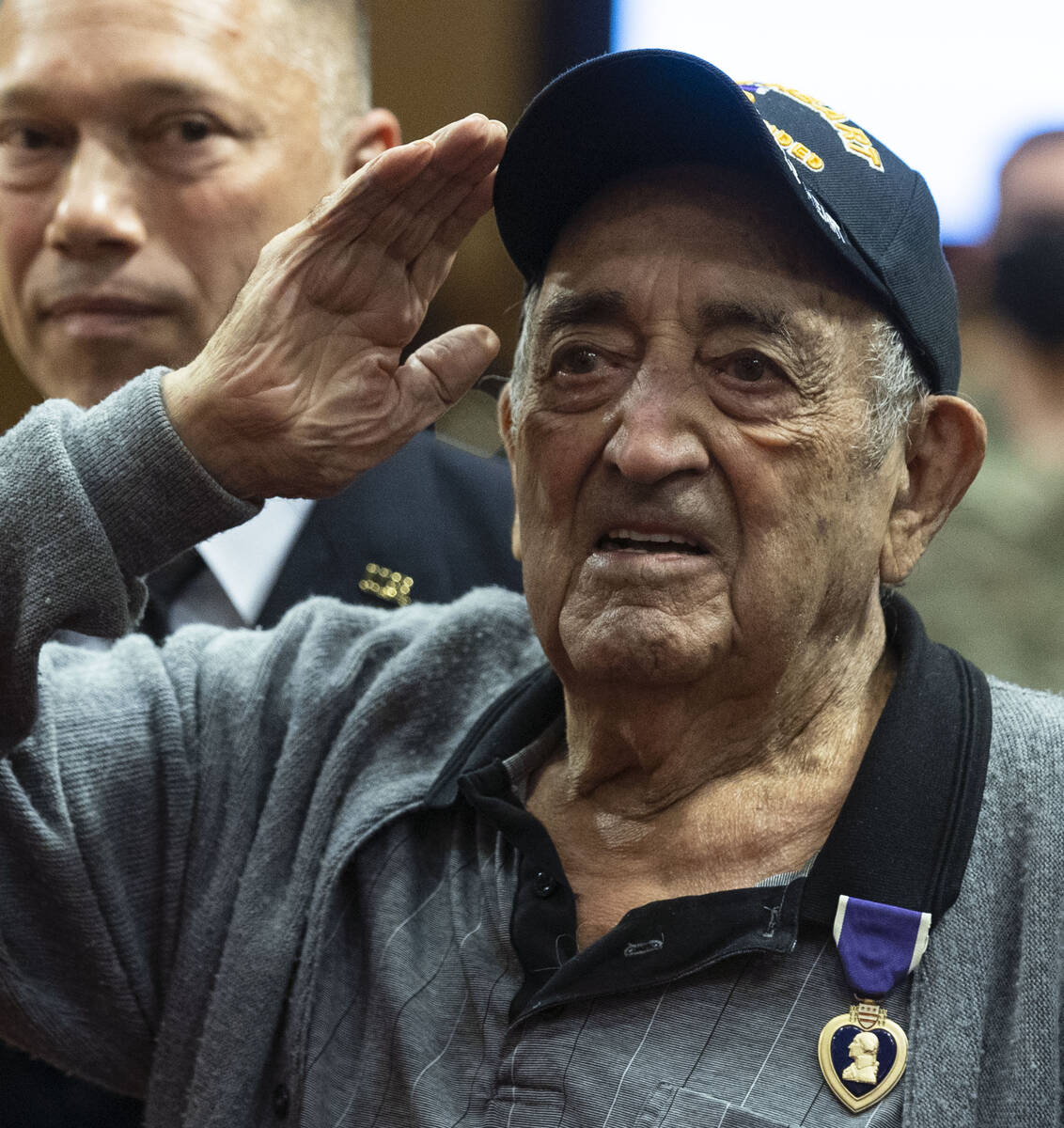 World War II veteran Onofrio "No-No" Zicari salutes after receiving a Purple Heart at Las Vegas ...