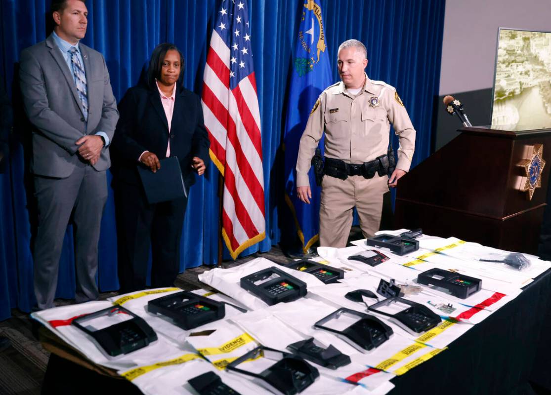 ATM and credit card skimming devices are displayed as Karon Ransom, second right, special agent ...