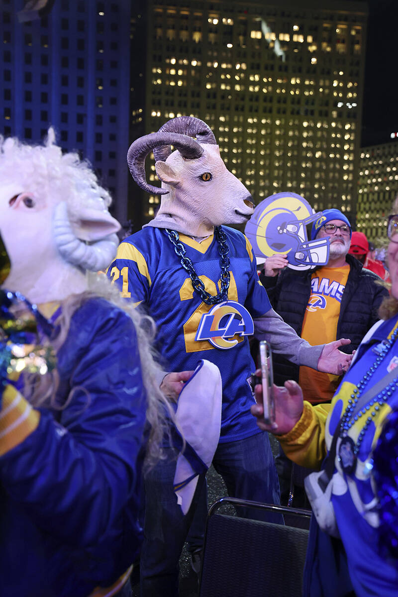 Los Angeles Chargers fans cheer during the first round of the NFL football draft, Thursday, Apr ...