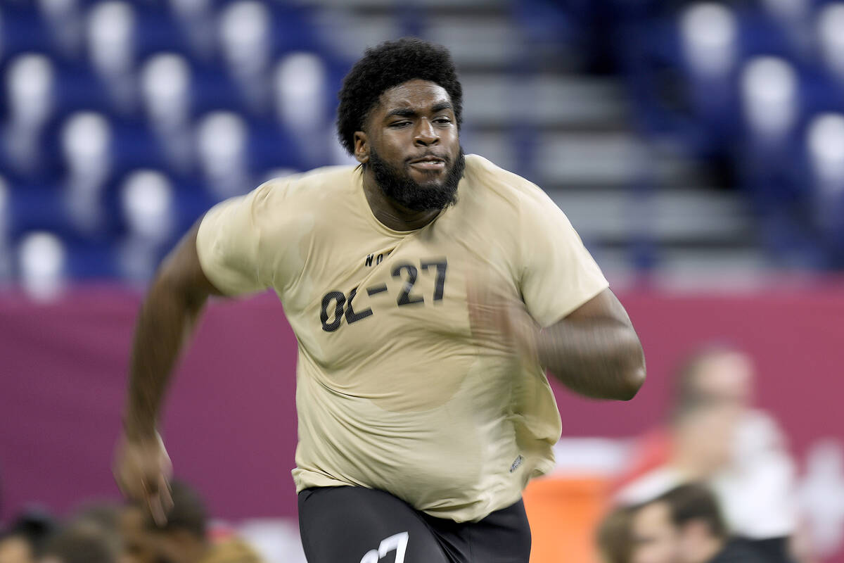 Maryland offensive lineman Delmar Glaze runs the 40-yard dash during the NFL football scouting ...