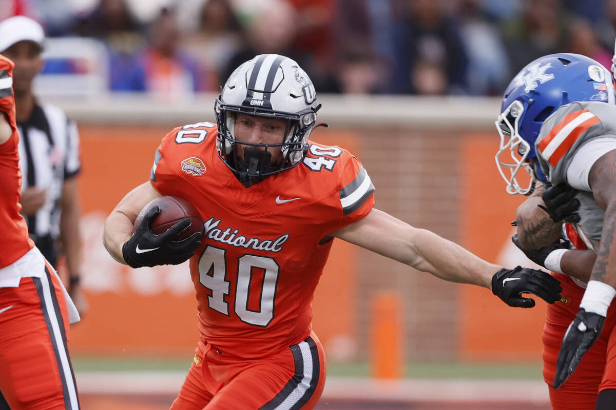 National running back Dylan Laube of New Hampshire (40) carries the ball during the second half ...