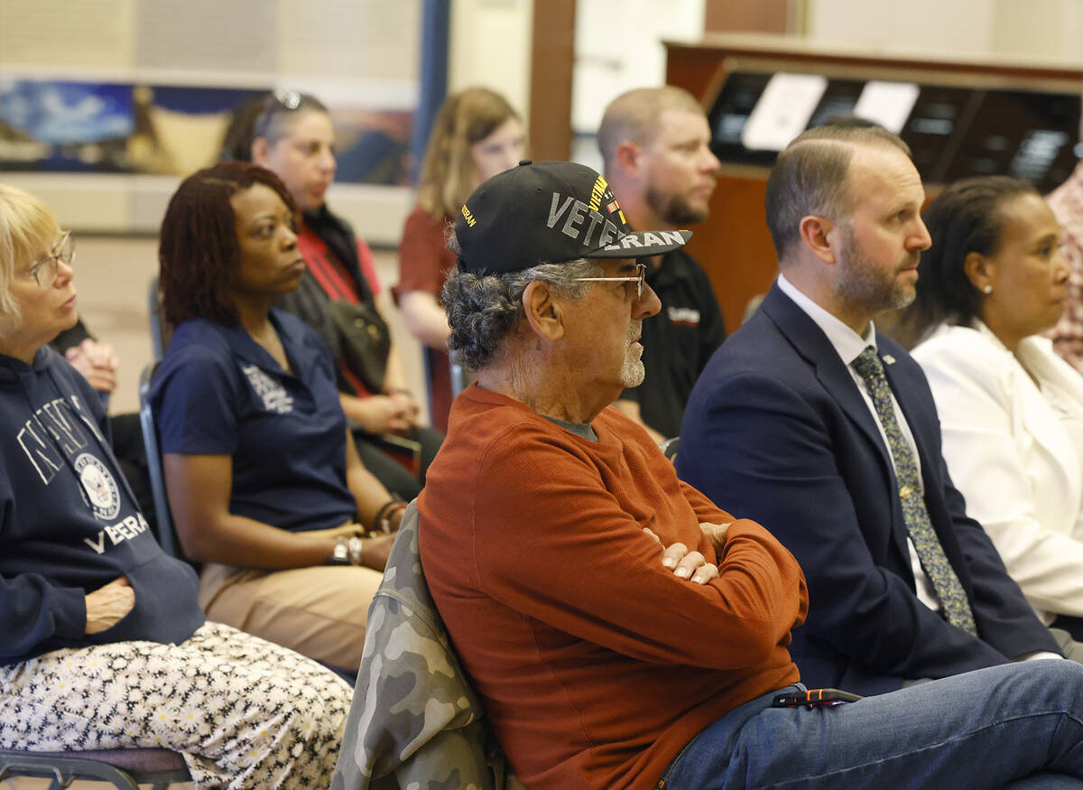 Veterans, including Pete Pizzola, center, a veteran of the U.S. Army, attend Vet the Vote event ...