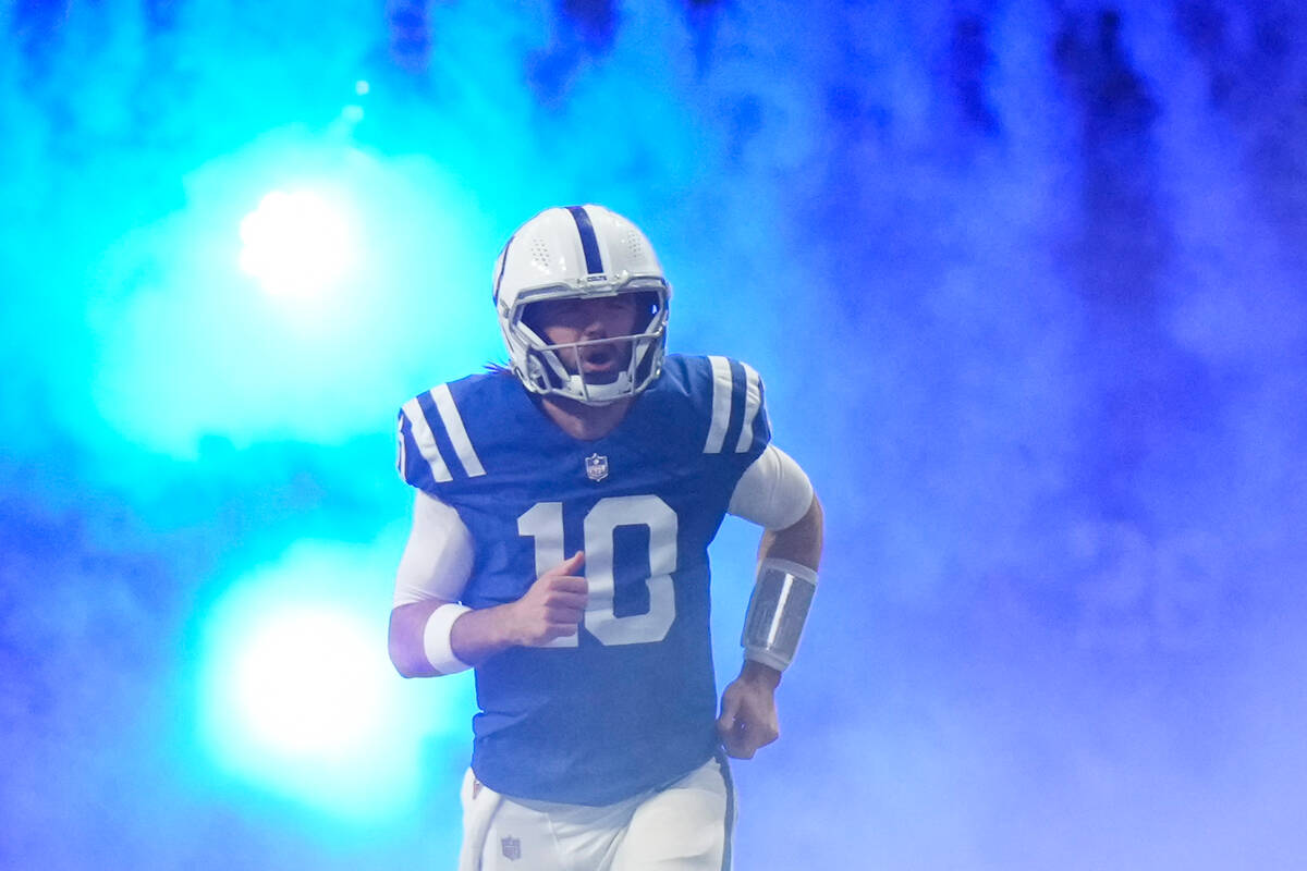 Indianapolis Colts quarterback Gardner Minshew (10) enters the field before an NFL football gam ...
