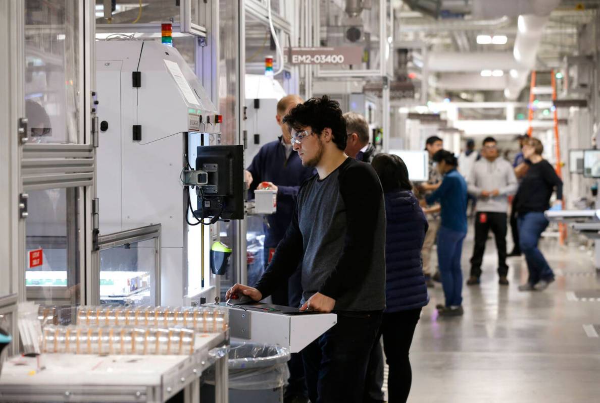 Jon Rabago works on the module line for power wall and power packs at the Tesla Gigafactory, ea ...