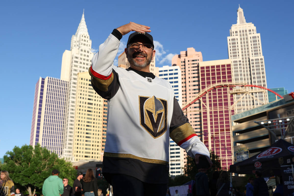A Golden Knights fan heads into T-Mobile Arena before Game 3 of an NHL hockey Stanley Cup first ...