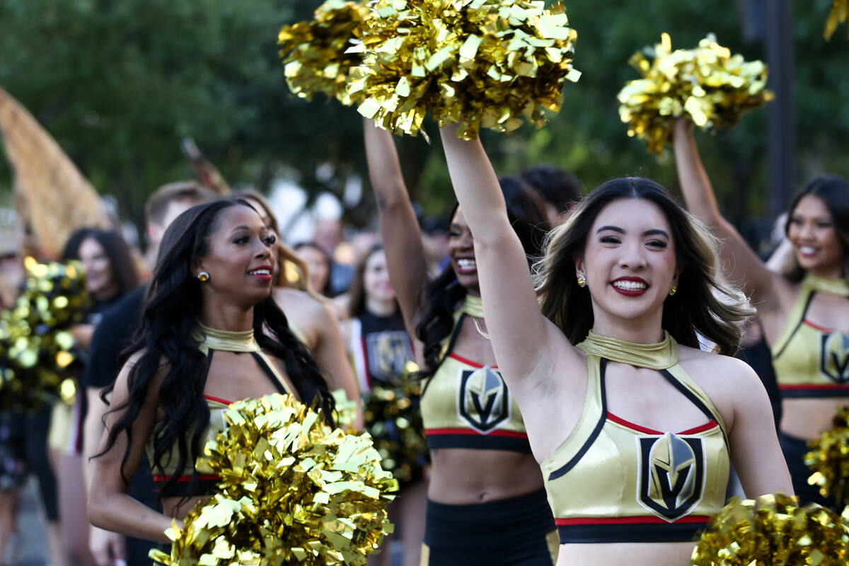 The Vegas Viva cheerleaders parade toward Toshiba Plaza before Game 3 of an NHL hockey Stanley ...