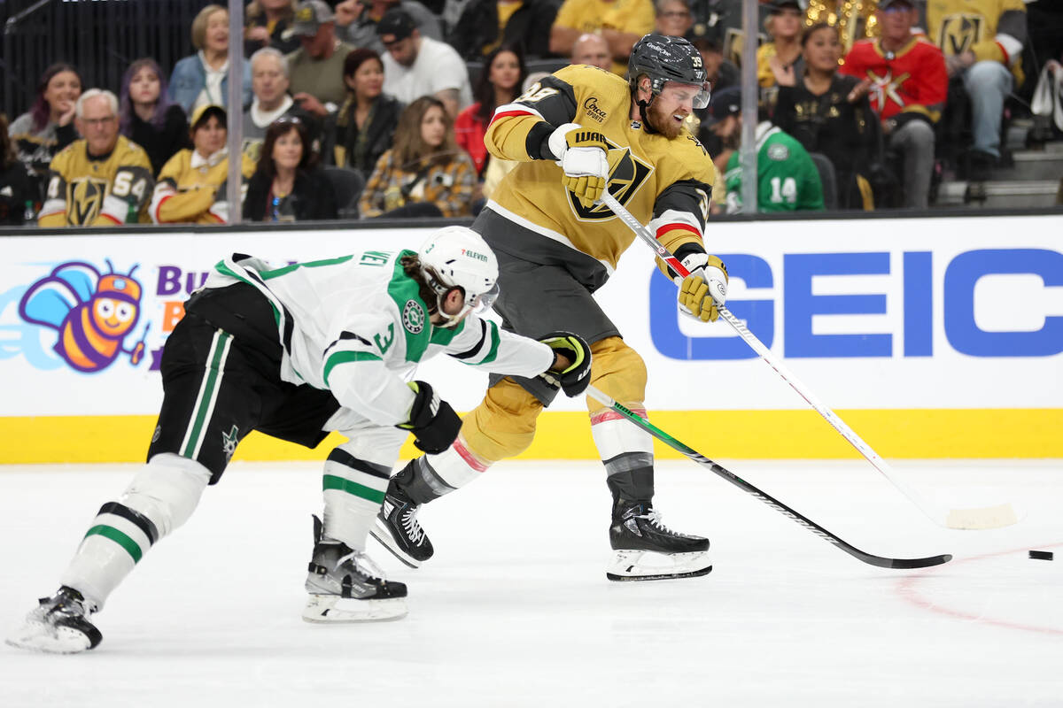 Golden Knights right wing Anthony Mantha (39) shoots against Stars defenseman Chris Tanev (3) d ...