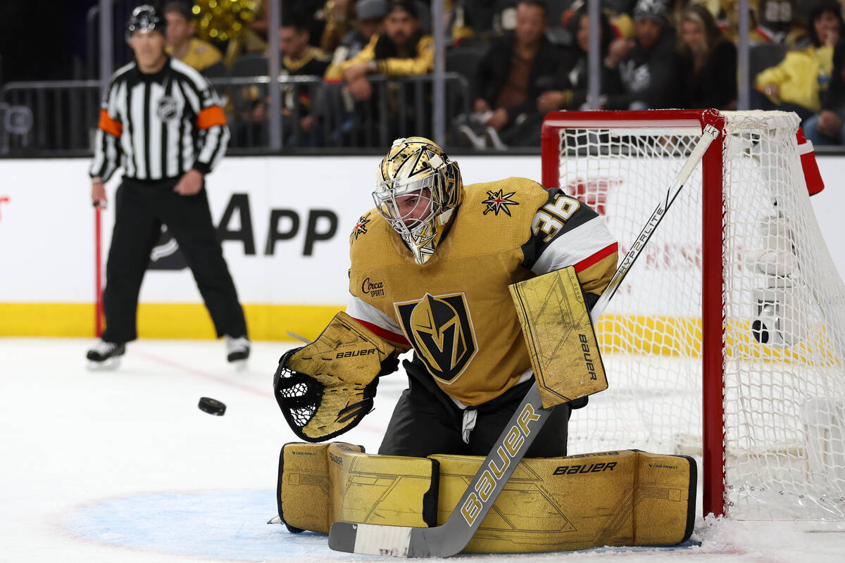 Golden Knights goaltender Logan Thompson (36) prepares to save the puck during overtime in Game ...
