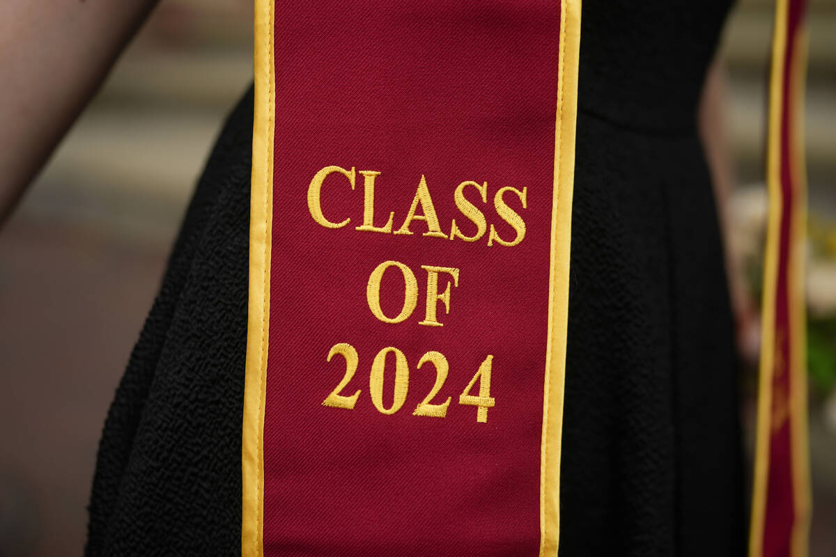 A recent graduate wears a garment with their graduation year on the University of Southern Cali ...
