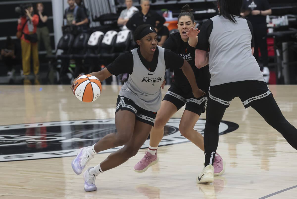 Las Vegas Aces guard Jackie Young drives the ball during practice at the team’s facility ...