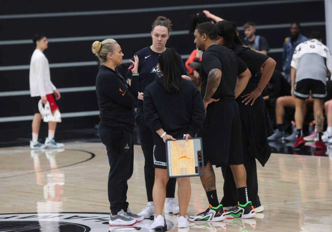 Las Vegas Aces head coach Becky Hammon, left, leads practice at the team’s facility on S ...
