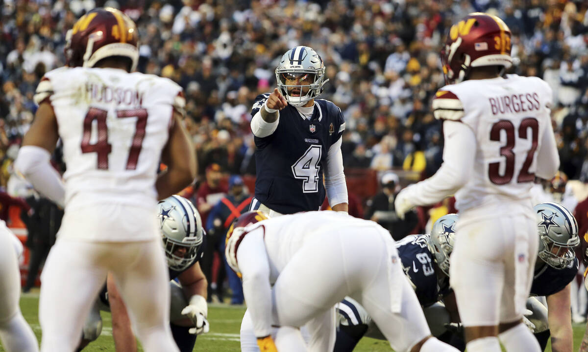 Dallas Cowboys quarterback Dak Prescott (4) pictured during an NFL football game against the Wa ...