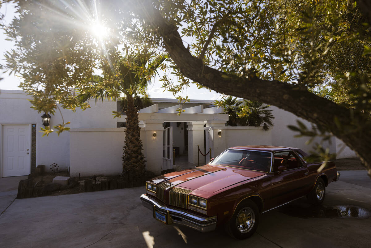 A 1977 Oldsmobile Cutlass Supreme is seen outside of a 1975 home in the historic Pinto Palomino ...