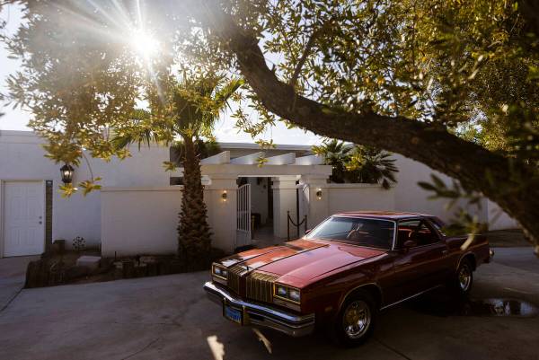 A 1977 Oldsmobile Cutlass Supreme is seen outside of a 1975 home in the historic Pinto Palomino ...