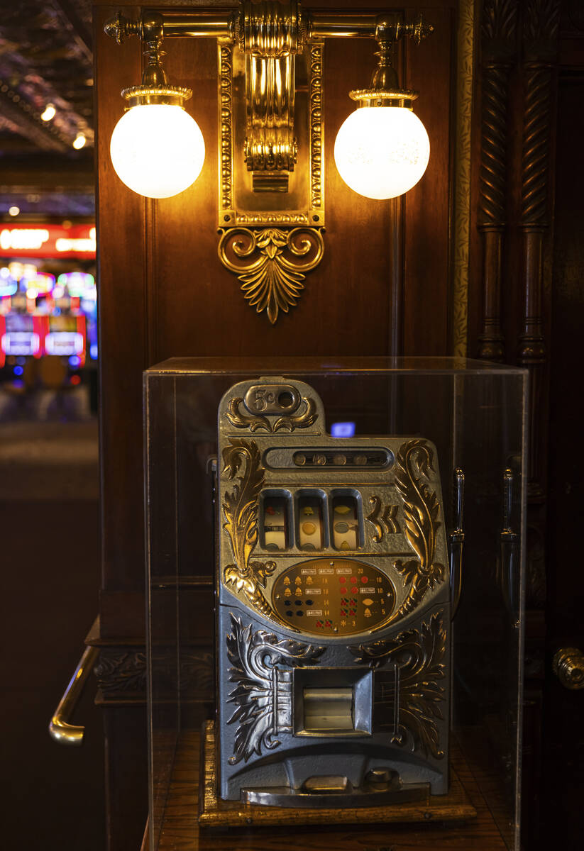 A vintage slot machines is displayed at Main Street Station during a tour of Fremont Street as ...