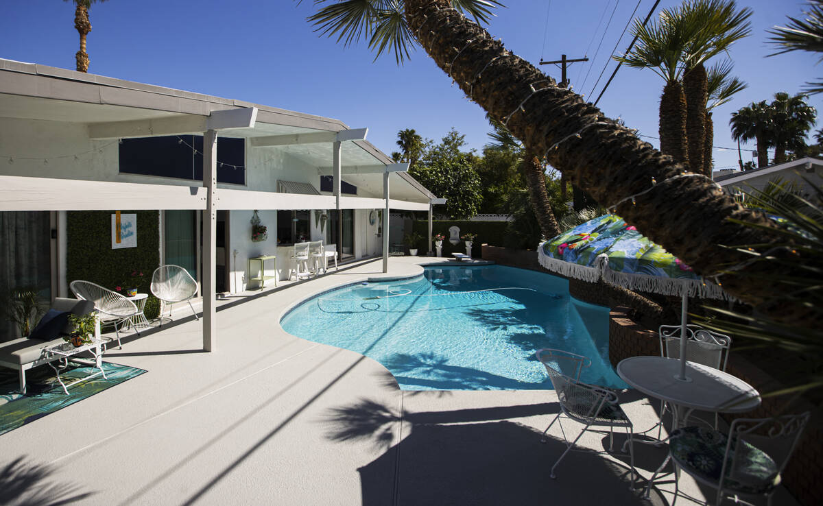 The pool area is pictured at a 1964 home in the historic Paradise Palms neighborhood during a t ...