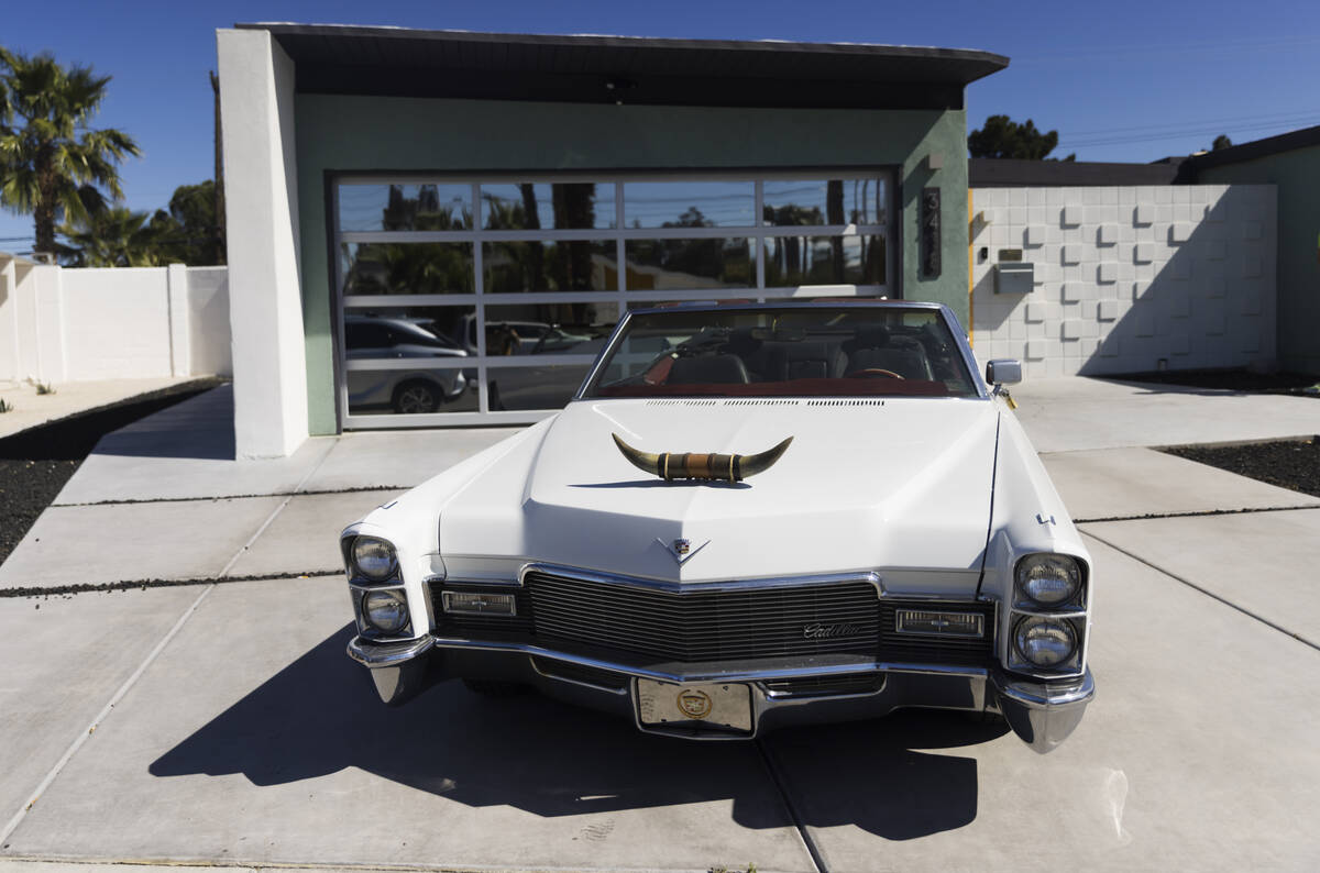 A vintage Cadillac sits outside of a 1964 home in the historic Paradise Palms neighborhood duri ...