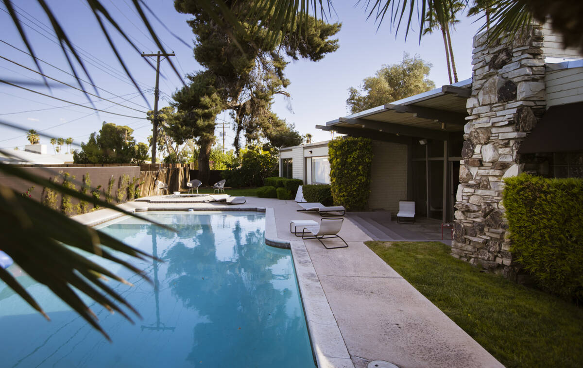 The pool area of a 1964 home is seen in the historic John S. Park neighborhood during a tour of ...