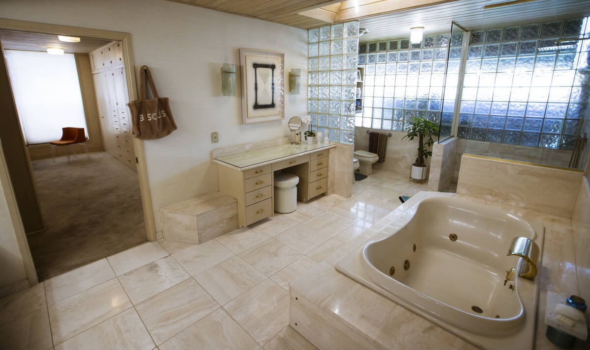 A bathroom and walk-in closet are seen in a 1964 home is seen in the historic John S. Park neig ...