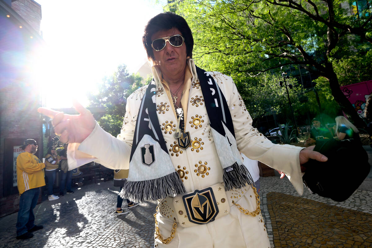 Elvis impersonator Jeff Stanulis shows off his Golden Knights gear before Game 4 of an NHL hock ...