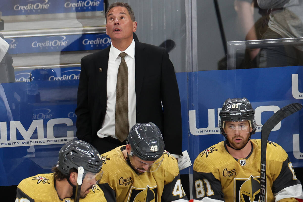 Golden Knights head coach Bruce Cassidy watches an instant replay during the first period in Ga ...