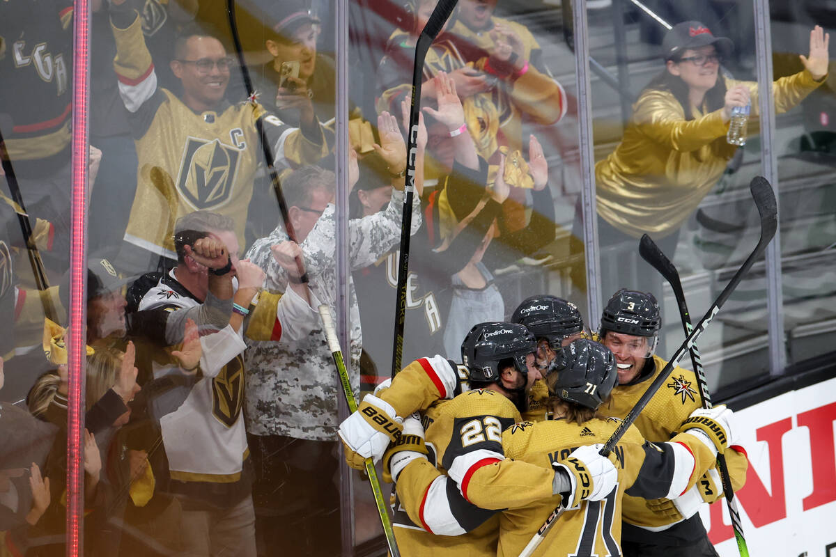 The Golden Knights celebrate a goal during the first period in Game 4 of an NHL hockey Stanley ...