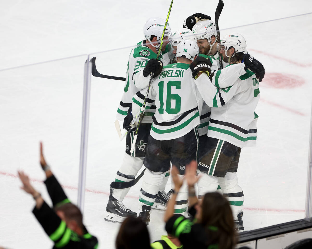 The Stars celebrate a goal during the first period in Game 4 of an NHL hockey Stanley Cup first ...