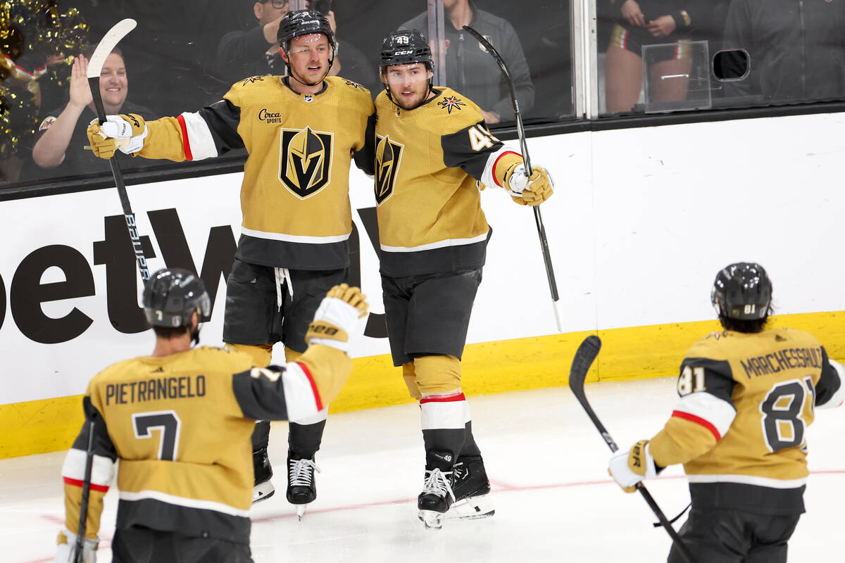 The Golden Knights celebrate a goal by center Jack Eichel (9) during the second period in Game ...
