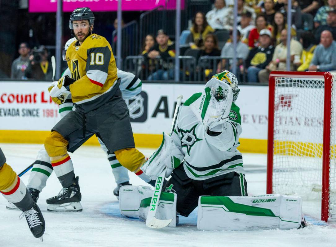 Golden Knights center Nicolas Roy (10) looks on as Dallas Stars goaltender Jake Oettinger (29) ...